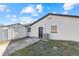 Home exterior with shed and AC unit at 745 Maloney Ln, Orlando, FL 32825