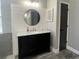 Bathroom with modern vanity, shiplap accent wall, and gray tile floors at 150 Verde Way, Debary, FL 32713