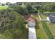 Aerial view showing house, driveway, and surrounding landscape at 17646 Washington St, Winter Garden, FL 34787