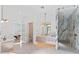 Bright bathroom with a glass-enclosed shower and double vanity at 1948 Rowena Ave, Orlando, FL 32803