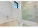 Modern bathroom with walk-in shower and floating vanity at 1948 Rowena Ave, Orlando, FL 32803