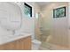 Modern bathroom with a walk-in shower and stylish vanity at 1948 Rowena Ave, Orlando, FL 32803