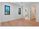 Light and airy bedroom with hardwood floors and ensuite bathroom at 1948 Rowena Ave, Orlando, FL 32803