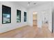 Light-filled bedroom with hardwood floors and closet access at 1948 Rowena Ave, Orlando, FL 32803