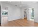 Spacious bedroom with hardwood floors and access to bathroom and closet at 1948 Rowena Ave, Orlando, FL 32803