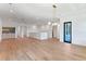 Spacious bonus room with hardwood floors, wet bar, and private balcony access at 1948 Rowena Ave, Orlando, FL 32803