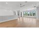 Spacious bonus room with hardwood floors and balcony access at 1948 Rowena Ave, Orlando, FL 32803