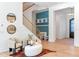 Bright and airy entryway with contemporary seating and built-in storage at 1948 Rowena Ave, Orlando, FL 32803