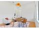 Bright home office features wood desk, comfortable chair, and natural light at 1948 Rowena Ave, Orlando, FL 32803