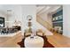 Open living space featuring hardwood floors and stylish seating area at 1948 Rowena Ave, Orlando, FL 32803