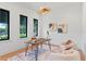 Home office with hardwood floors and large windows at 1948 Rowena Ave, Orlando, FL 32803