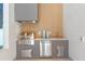Stainless steel outdoor kitchen with built-in grill and refrigerator at 1948 Rowena Ave, Orlando, FL 32803