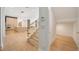 Modern staircase with gold railing leading to the upper level at 1948 Rowena Ave, Orlando, FL 32803