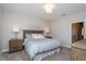 Large bedroom with king bed and en-suite bathroom access at 2108 Lobelia Dr, Lake Mary, FL 32746