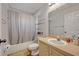 Clean bathroom with a tub shower and updated vanity at 2460 Oak Mill Dr, Kissimmee, FL 34744