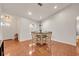 Dining area with a wooden table, chairs, and tile flooring at 2460 Oak Mill Dr, Kissimmee, FL 34744