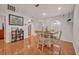 View of dining area with table and access to kitchen at 2460 Oak Mill Dr, Kissimmee, FL 34744
