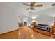 Spacious living area with comfy couch and view into dining area at 2460 Oak Mill Dr, Kissimmee, FL 34744