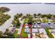 Aerial view of waterfront property with surrounding houses at 26603 W Cove Dr, Tavares, FL 32778