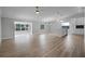 Open living room with modern kitchen and island at 26603 W Cove Dr, Tavares, FL 32778