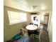 Small dining area with a round table and chairs at 30 E Ella J Gilmore St, Apopka, FL 32703