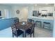 Open concept kitchen with island and modern appliances at 310 Gardenia Ct, Poinciana, FL 34759