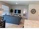 Spacious living room featuring a large TV and comfortable seating at 310 Gardenia Ct, Poinciana, FL 34759