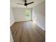 Bright bedroom with ceiling fan and vinyl plank flooring at 4171 Radford Rd, Bartow, FL 33830