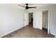 Simple bedroom with wood-look floors and a closet at 4171 Radford Rd, Bartow, FL 33830