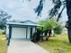 Newly renovated home with carport and driveway at 4171 Radford Rd, Bartow, FL 33830