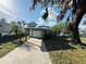 Landscaped yard with driveway leading to home at 4171 Radford Rd, Bartow, FL 33830