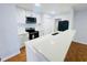 Modern white kitchen with breakfast bar at 4171 Radford Rd, Bartow, FL 33830