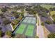 Community tennis and pickleball courts with ample parking at 4694 Monica St, The Villages, FL 32163