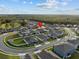 Aerial view of a house in a quiet cul-de-sac neighborhood at 489 Avila Pl, Howey In The Hills, FL 34737