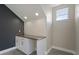 Wet bar with granite countertop and wave patterned backsplash at 12927 Magnolia Pointe Blvd, Clermont, FL 34711