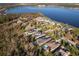 Luxury homes community by the lake with lush landscaping at 15144 Pendio Dr, Montverde, FL 34756