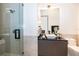 Clean bathroom, featuring a walk-in shower and modern vanity at 15144 Pendio Dr, Montverde, FL 34756