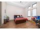 Cozy bedroom with double bed, wood floors, and plenty of closet space at 15144 Pendio Dr, Montverde, FL 34756