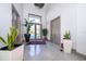 Elegant entryway with high ceilings and access to the living and dining areas at 15144 Pendio Dr, Montverde, FL 34756