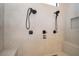 Double shower heads and built-in bench in this spacious shower at 15144 Pendio Dr, Montverde, FL 34756