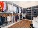 Large walk-in closet with ample shelving and hanging space at 15144 Pendio Dr, Montverde, FL 34756