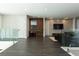 Elegant hallway with dark hardwood floors and a modern vanity at 15614 Espalier Way, Winter Garden, FL 34787