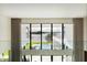 Stunning lake view from a two-story home with a pool at 15614 Espalier Way, Winter Garden, FL 34787