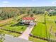 Aerial view of two-story house with a large grassy yard at 19206 Robertson St, Orlando, FL 32833