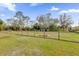 Large fenced backyard with a shed and garden area at 19206 Robertson St, Orlando, FL 32833