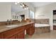 Elegant bathroom with double vanity, soaking tub, and walk-in shower at 19206 Robertson St, Orlando, FL 32833