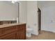 Bathroom with granite vanity, large mirror, and shower at 19206 Robertson St, Orlando, FL 32833