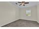 Bright bedroom with carpet and ceiling fan at 19206 Robertson St, Orlando, FL 32833