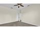 Spacious bedroom with ceiling fan and neutral color palette at 19206 Robertson St, Orlando, FL 32833