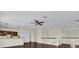 Open bonus room with hardwood floors and wet bar at 19206 Robertson St, Orlando, FL 32833